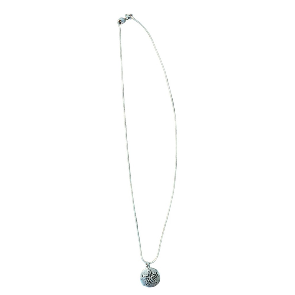 Necklace with sand dollar pendant